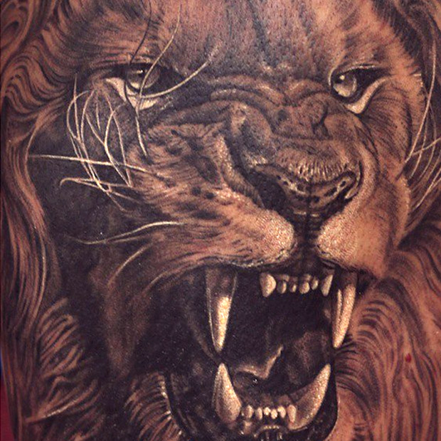 Lion tattoo.